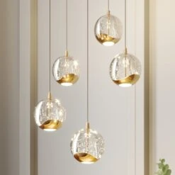 Lucande LED-Pendellampe Hayley, 5-fl., Rund, Gold