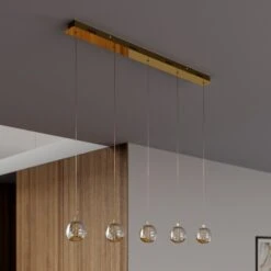 Lucande LED-Pendellampe Hayley, 5-fl., Länglich, Gold 11 Lucande LED-Pendellampe Hayley, 5-fl., Länglich, Gold -Lucande 9624458 2